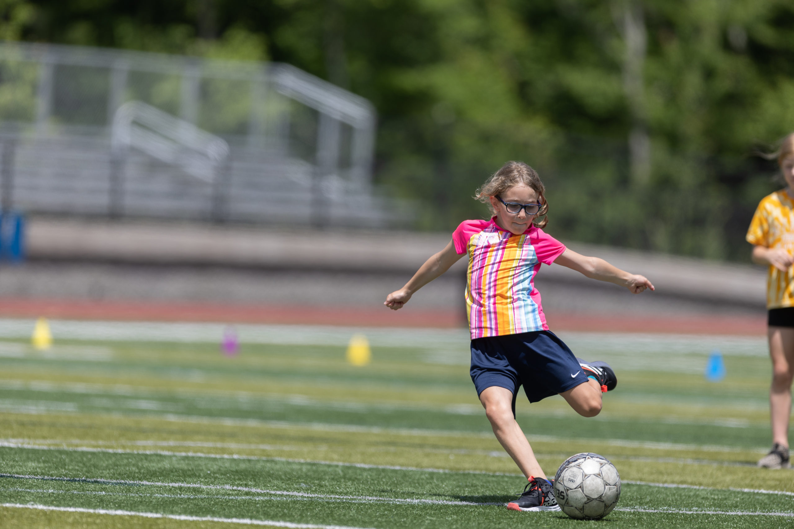 girl playing soccer
